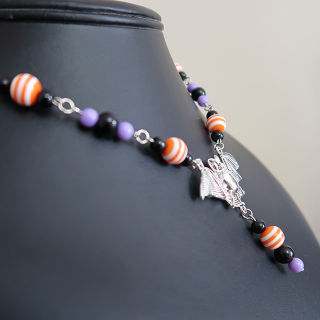 Striped Bat necklace (side view)